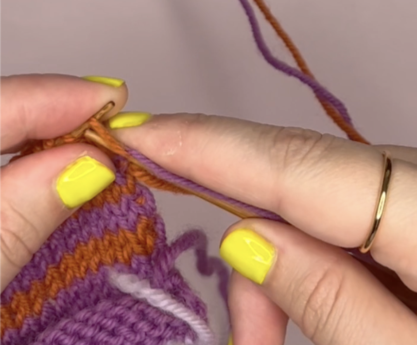 knitting into the first stitch with the alternative colour of yarn